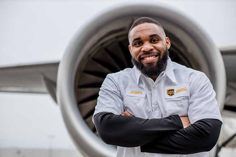 Javier in front of UPS airplane